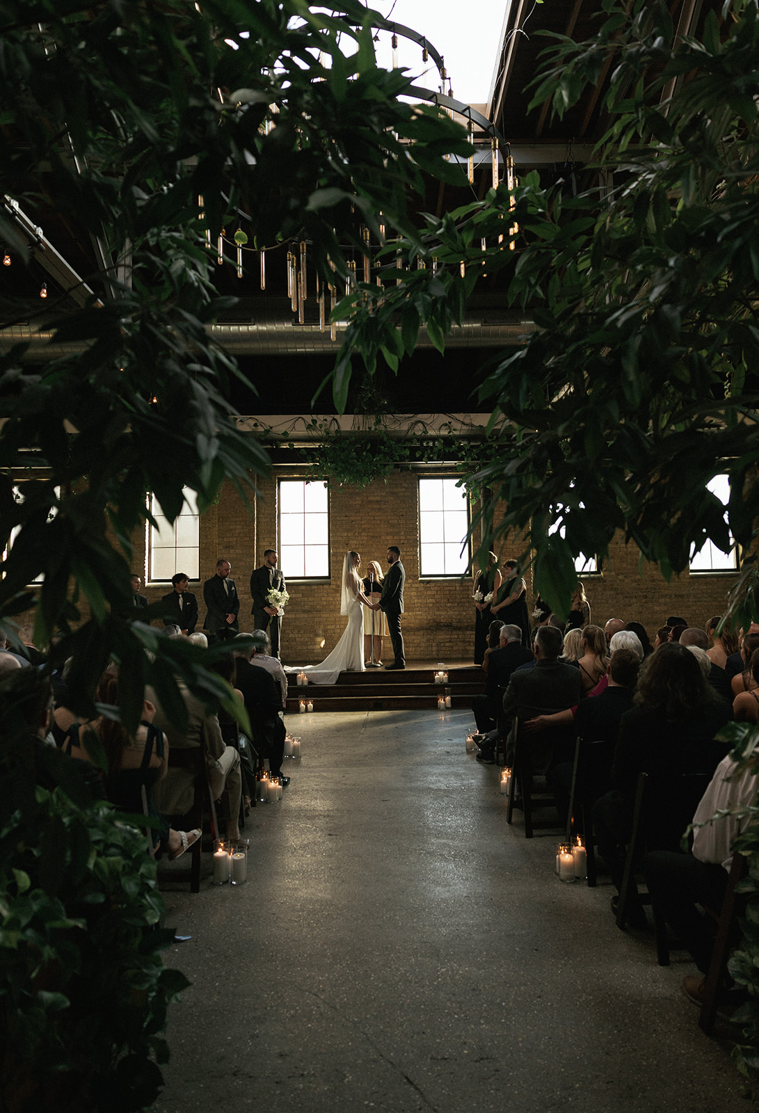 Lush greenery shining during Ivy House ceremony